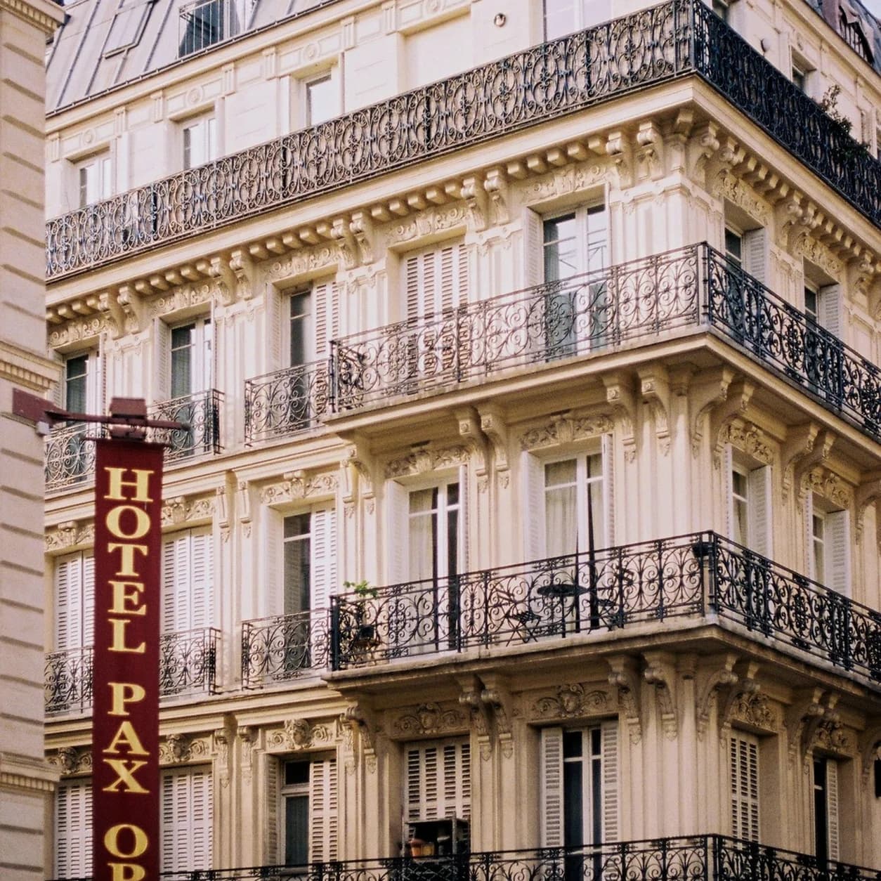 The same architecture photo after the fictional brand badge was removed