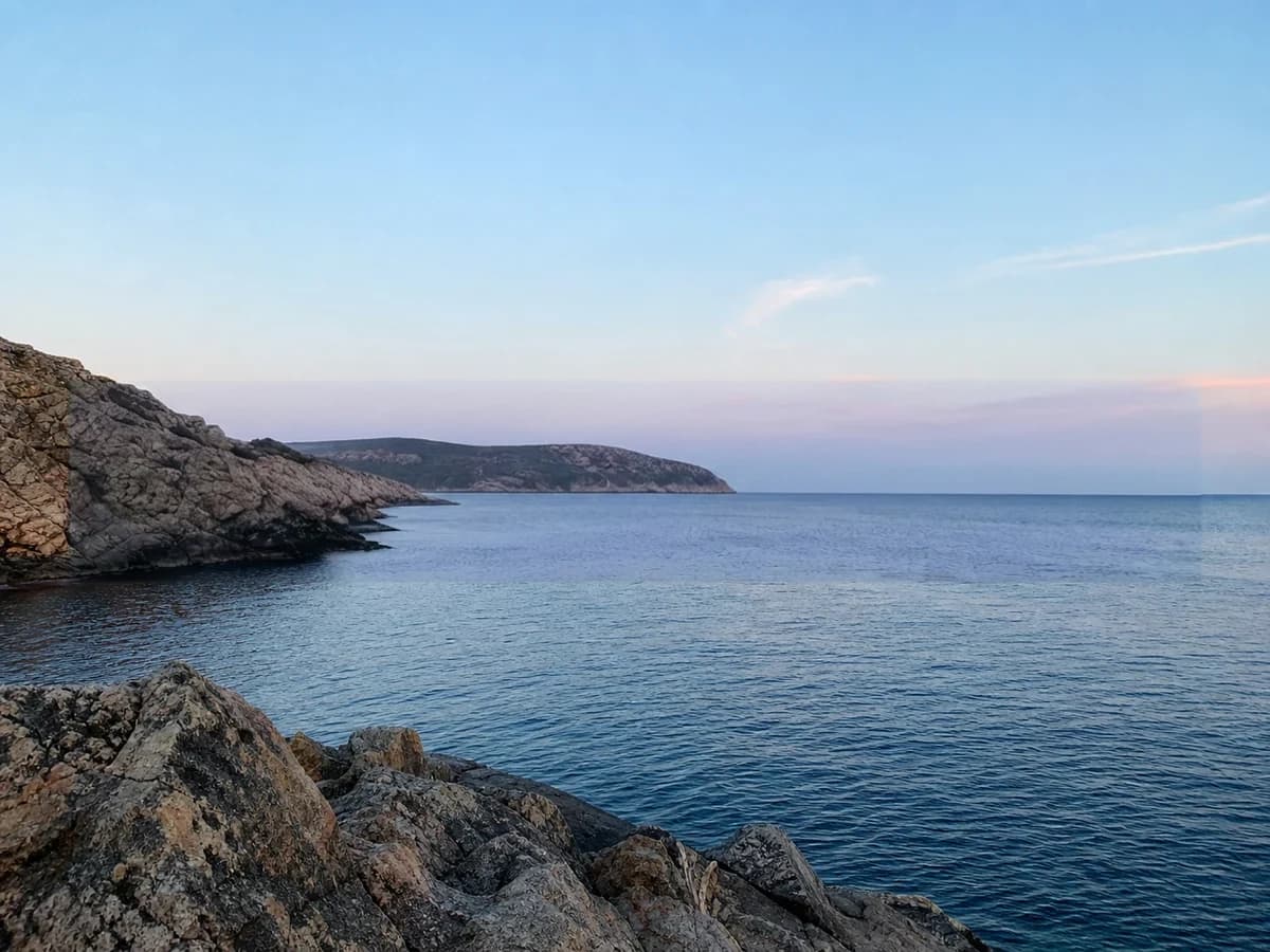The same coastal photo after the authorized sample watermark was removed